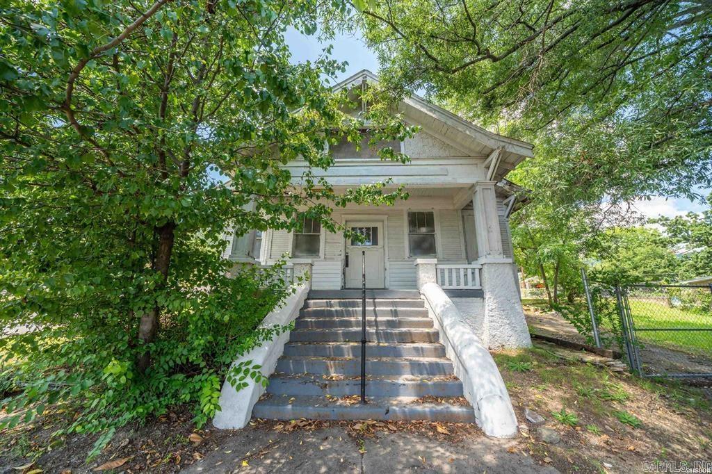 REDUCED AND PRICED TO SELL! Prime Commercial Property for Sale in Hot Springs, AR. Perfect for residential, business or BOTH! Live and work from home! Located in a high traffic area between the historic Bathhouse Row and Oaklawn Racing & Gaming, this exceptional commercial property offers unbeatable visibility and exposure. Situated on a corner lot with 100 feet of frontage along Central Ave, this double lot boasts a asphalt parking lot for convenience and ample space for your business needs .Zoned C-G, this property offers a versatile space perfect for a studio, office, or home-based business. The building features an open floorplan with high ceilings, providing a bright, airy atmosphere ideal for creative or professional use. With a high traffic count and prime location, this property is positioned to attract both local and tourist foot traffic, making it an ideal investment opportunity. Don’t miss out on this rare opportunity to own a piece of Hot Springs' thriving commercial landscape. Seller has an active AR real estate license. Selling as is.
