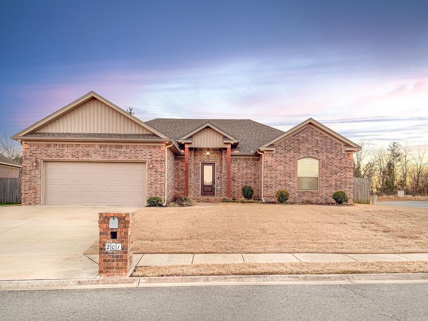 Welcome to this beautiful 3-bedroom, 2-bath home located in the desirable Cross Creek Subdivision, situated on a huge, fully fenced corner lot. Inside, you’ll find wood-look tile flooring throughout the main living areas with carpet in the spare bedrooms for added comfort. The living room features a tray ceiling and an electric fireplace with a tumbled stone surround and shiplap accent above the mantel, creating a warm and inviting space. The kitchen offers granite countertops, a stylish hexagon tile backsplash, and a breakfast bar. Perfect for both everyday living and entertaining. The primary suite is a relaxing retreat with separate vanities, a walk-in shower, a soaking tub, a private toilet room, and a spacious walk-in closet. Enjoy outdoor living year-round on the covered back porch, with plenty of yard space thanks to the oversized corner lot. Don't miss out on the opportunity to call this place home!
