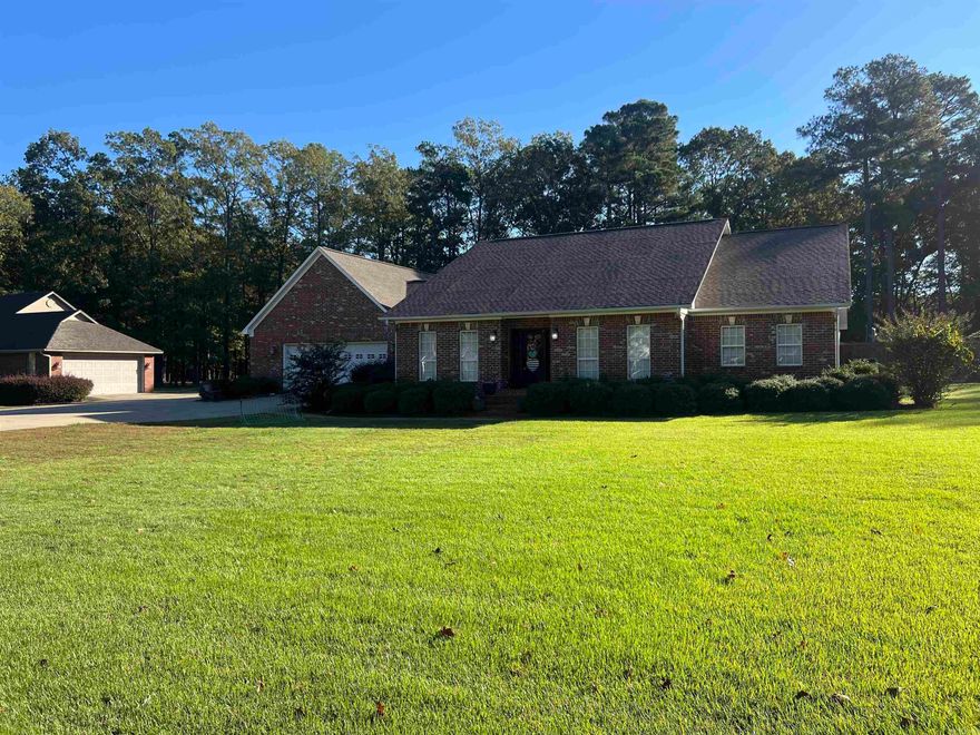 Well-built 3 bedroom, 3.5 bath brick home has it all with thoughtful design and spacious layout. The large master suite offers the perfect retreat, featuring a relaxing garden tub, separate shower, and double vanity. The sunroom or office area opens directly onto the inviting patio—ideal for morning coffee or quiet work-from-home moments. The home’s spacious kitchen has granite countertops, stainless steel appliances, a breakfast bar, and an inviting eating area, along with a separate dining room. The large living room boasts beautiful built-ins and an open, comfortable feel. A second office area currently being used as a fourth bedroom, adds flexibility. Both guest bedrooms are generously sized, each with its own designated bathroom for added privacy and convenience. Step outside to your own backyard oasis, complete with a whole house generator, large patio perfect for entertaining and an in-ground swimming pool. Just beyond the pool sits a 40x60 shop featuring approximately 900 square feet of finished living space with a full bathroom granite countertops, a convenient rollup window to the pool area, and a roll-up door into garage. Welcome Home!