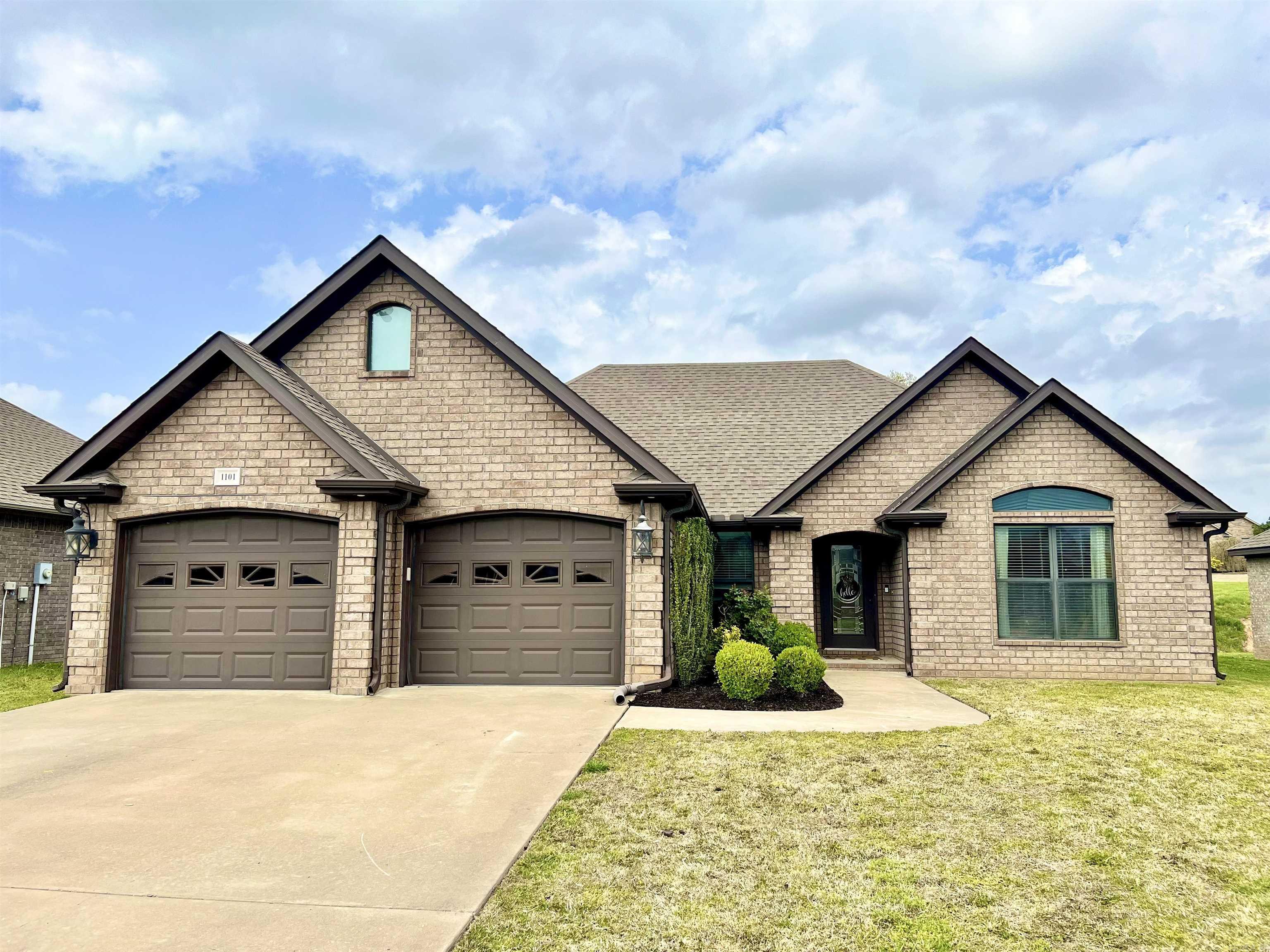 A 3-bedroom, 2-bathroom home with an open concept layout, an additional space for an office, play area, or extra storage. It also features a patio and a fenced backyard.