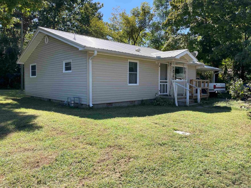 This cozy 3-bedroom, 1-bath home is a perfect opportunity for first-time homebuyers or as a rental investment. Located in the heart of Heber Springs. Hardwood floors through most of this home. Updated metal roof, siding, and windows. Step outside to a serene large with creek, creating a peaceful retreat right at your doorstep. With its unbeatable location and potential, this property is ready for you to make it your own.