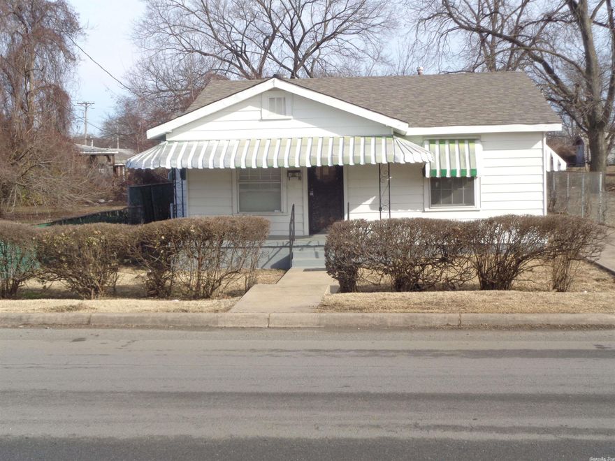 An interesting mix of the new improvements with the comfortable style of the past. The new features include a new roof, new hvac system, new water heater, new bathroom, new interior paint, new flooring all in this spacious 3 bedroom, 1 & 1/2 bath house with a formal living room, dining room, breakfast nook, bonus office space and a large backyard with room for a garden or dog run. And of course it has hardwood floors and roomy bedrooms.  Agents check remarks.