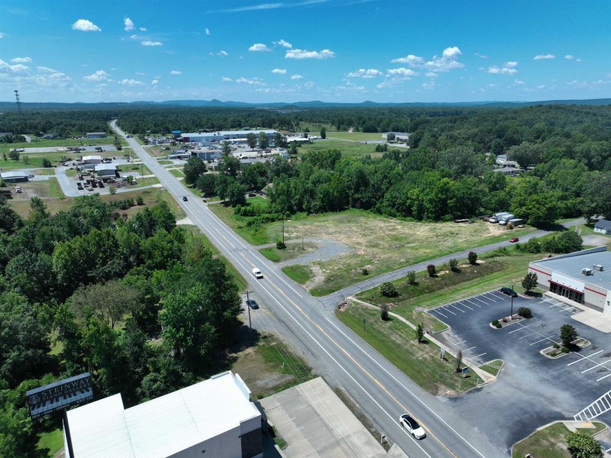 Prime 1.8-Acre Corner Lot just minutes from I-40 and centrally located between Conway and Little Rock — this is a rare opportunity to secure highly visible frontage in one of Central Arkansas’ most strategic growth corridors.  Positioned at the intersection of convenience and opportunity, this property offers dual road access, excellent traffic exposure, and flexible zoning options — making it ideal for a retail center, gas station, franchise development, medical or office space, or a high-visibility logistics hub.  With over 500 feet of total road frontage and close proximity to major highways, utilities, and thriving residential communities, this lot is ready for your next big build or investment project.