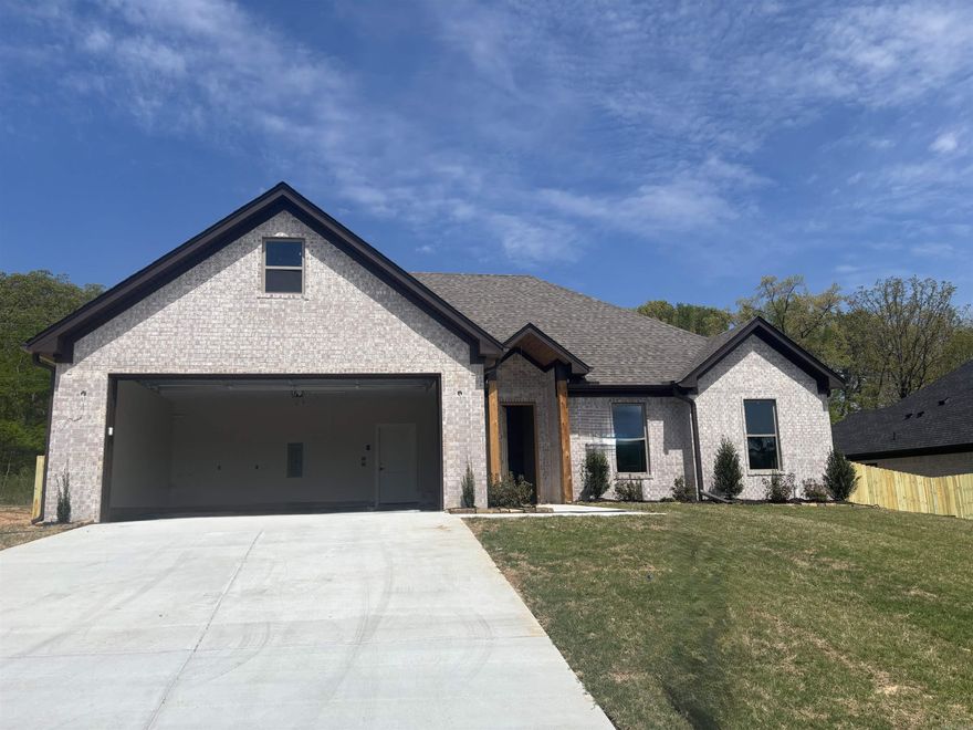 This home is close to schools and interstate, five minutes from downtown Benton. LVP flooring, granite countertops, large walk in pantry,gas cooktop with wall oven. Primary has custom tile shower with free standing tub. Primary has extra large closet. Other bedrooms have custom built closets. This home comes with privacy fence.