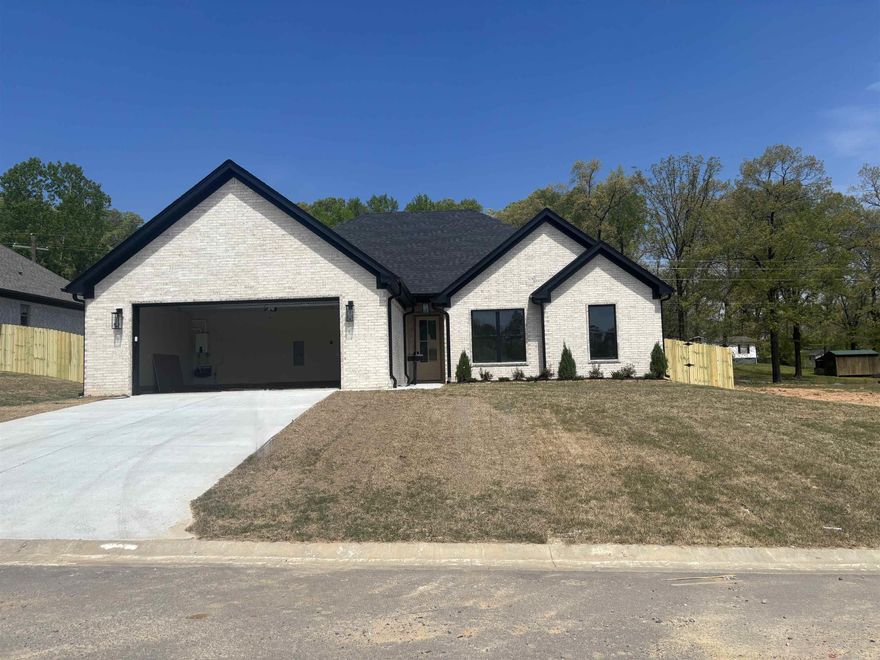 This home is close to schools and interstate, five minutes from downtown Benton. LVP flooring, granite countertops, large walk in pantry,gas cooktop with wall oven. Primary has custom tile shower with free standing tub. Primary has extra large closet. Other bedrooms have custom built closets. This home comes with privacy fence.