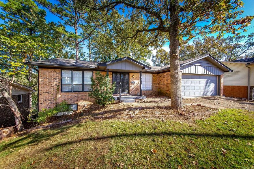 Great home for the family!  4 bedrooms (2 main level), 3 full baths, formal dining room, living room, eat in kitchen, glass garden room, downstairs den with fireplace, built in wet bar, extra room that could be used for a bedroom or office.  Large private back yard, 2 car garage, newer roof.