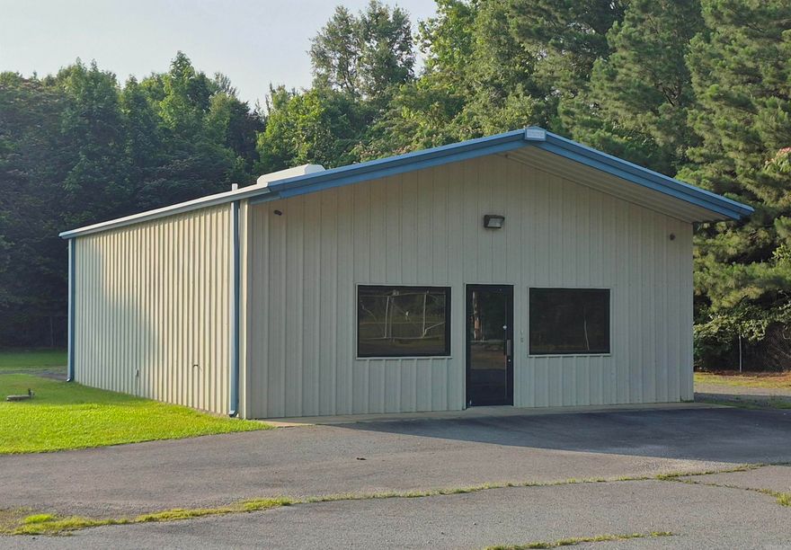 Attention investors and commercial business owners!! Please come check out this awesome office and commercial building right in the entrance of the East End Community (Saline Co.) A perfect opportunity to open a new thriving business or invest in a new rental property. Reach out anytime for a showing!!