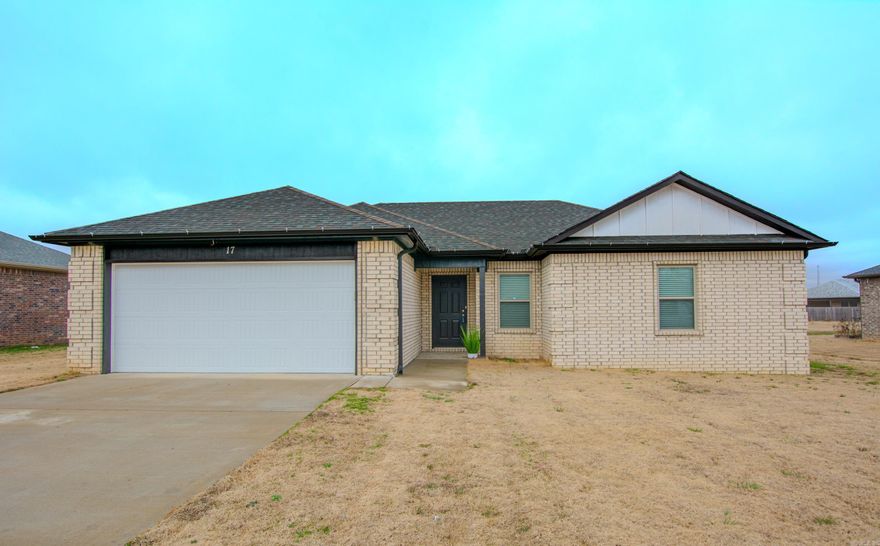 WOW! This one is better than brand new, already has blinds in all windows, living room has vaulted ceiling and is huge! Open floor plan, makes entertaining perfect! Nice kitchen with quartz countertops, farmhouse sink, breakfast bar and stainless steel appliances! The lighting in this house is amazing, bright and cheerful! Master suite is spacious and has pan ceiling! Master bath has quartz double vanity, beautiful large walk-in tiled shower with rain shower head and an extra large closet! This home also offers split bedroom plan, more privacy for family. Great covered back patio, perfect for a cookouts! The front and back covered patio has wood ceilings, so pretty! Call to schedule your showing, you'll be glad you did!