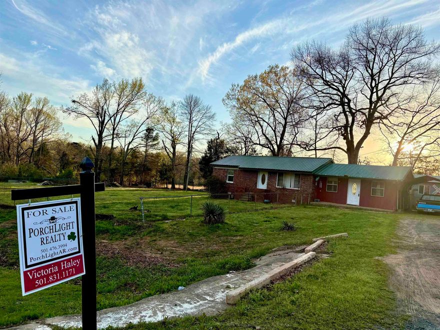 Hard to find acreage with a workshop in the Cabot area. This 2 bedroom, 1 bathroom home sits on approximately 1 acre along Hwy 107 and offers a great opportunity for someone looking for space, a shop, and the chance to make a property their own. The detached workshop provides excellent room for tools, hobbies, storage, equipment, or weekend projects. The one acre lot offers plenty of room to spread out and enjoy the outdoors. Whether you want space for gardening, outdoor activities, or simply a little more privacy, this property provides a rural setting while still being just a short drive to Cabot shopping, dining, and schools. Properties with land and a shop in this area do not come available often. This property is a great opportunity for buyers looking for a place with potential and room to improve over time. Perfect for someone wanting space for projects, storage, or outdoor equipment.