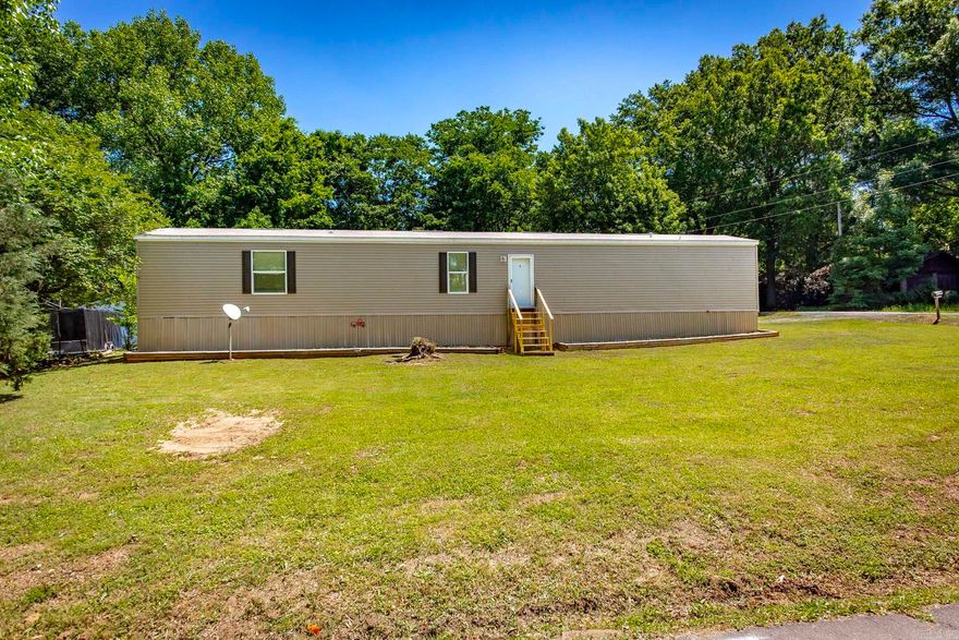 Enjoy lake living without the waterfront price! This 3-bedroom, 2-bath home offers 1,136 sq ft of comfortable living space on a permanent foundation, perfectly positioned just across from Lake Conway. Whether you’re looking for a full-time residence, weekend getaway, or investment opportunity, this location delivers.  Be part of Lake Conway’s exciting 5-year transformation currently underway—making now the perfect time to buy and benefit from the lake’s future improvements, including enhanced boating access, upgraded infrastructure, and improved recreation.  Inside, you’ll find a functional layout with great potential, while outside offers a storage building for added convenience. The property also provides quick and easy access to the interstate, making commuting to Conway or Little Rock a breeze.  Opportunities like this don’t come around often—secure your spot near one of Central Arkansas’ most popular lakes while it’s on the rise. Schedule your showing today!