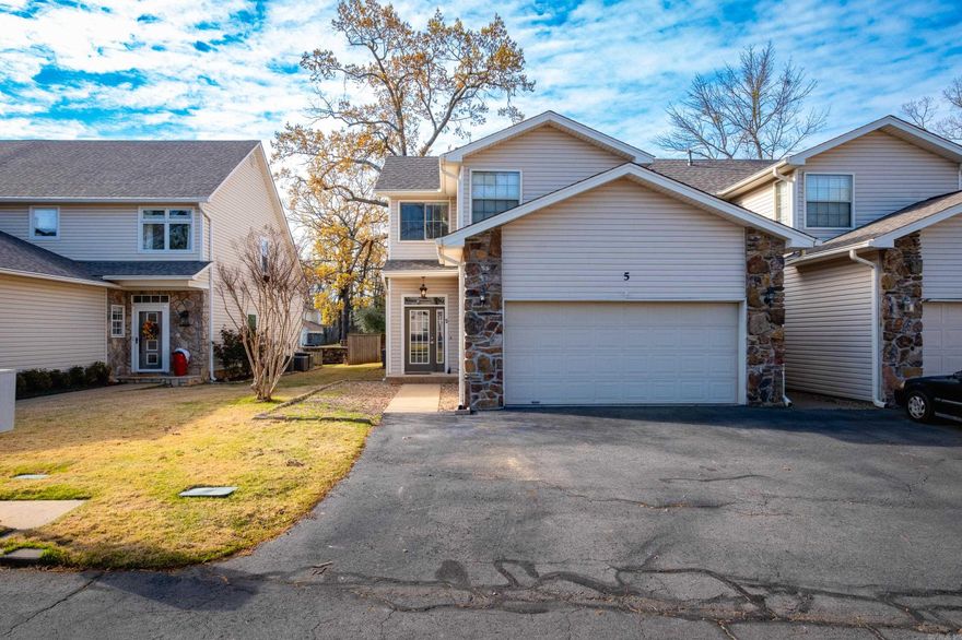 Completely remodeled townhouse in Fairway Woods! Primary bedroom downstairs that opens to the back deck, fully renovated kitchen open to the living room, roof 2025, hvac 2021, hwh 2023 new flooring 2023 and kitchen remodel 2020!