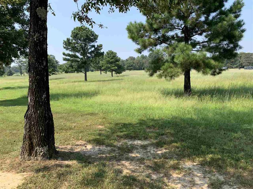 Outstanding views and cleared ground set up for building and close to town!!! Right on HWY 13 west of Searcy.  Growing residential area with plenty of room on back side of property for a home that will feel isolated.  The tract has a small upslope from the street for great views, no drainage issues, cleared and ready for building.