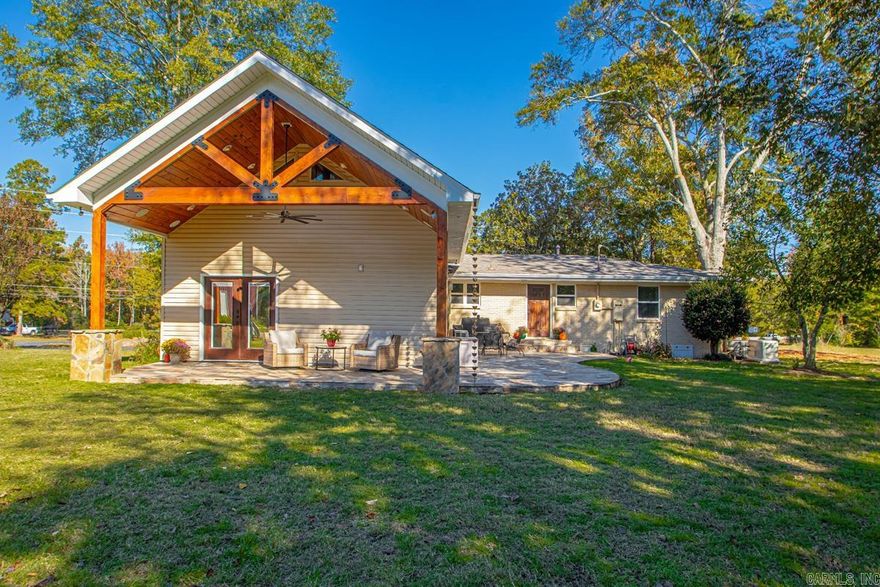 This 3 bed 2 bath home offers 2,480 sq ft of comfortable living space designed for both relaxation and entertainment.  Inside you'll find new appliances, indoor entertainment system, and the peace of mind that comes with a whole-home generator and FEMA certified safe room.  Step outside to enjoy the beautifully finished rock patio, entertainment system, stocked pond w/beach, and personal firing range.  The property also includes a fully insulated 40x50 shop that has it's own septic, water, HVAC, and car lift.  There are many more features that you just have to see!! Give us a call and lets get you a showing!!