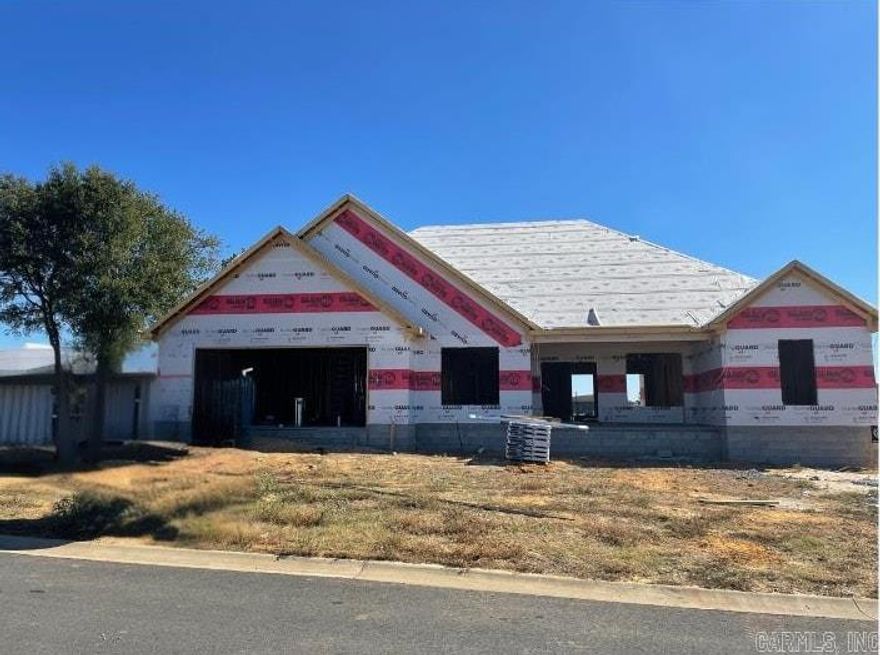 New Construction in Belmont Estates - Searcy, AR! This 4-bedroom, 2.5-bath home offers 2,474 sqft of timeless design with a fresh, modern edge. Youāll love the open split floor plan with LVP flooring throughout, a kitchen featuring a gas range, granite countertops, and a spacious walk-in pantry ā all flowing into a living area centered around a stunning floor-to-ceiling stone electric fireplace. The laundry room includes extra storage space, lockers that passes through to the owner suite side first starting with the closet, then bathroom that features a walk-in tile shower, soaker tub, double sinks, lighted mirrors boasting with natural lighting. Other features of the house include gas heat, gas tankless water heater to add extra efficiency to everyday living. Enjoy quiet evenings or weekend gatherings on the covered back patio! Reach out today for details or to schedule a private tour! 2 10 Year special builder warranty. Estimated completion date Feb 2026.
