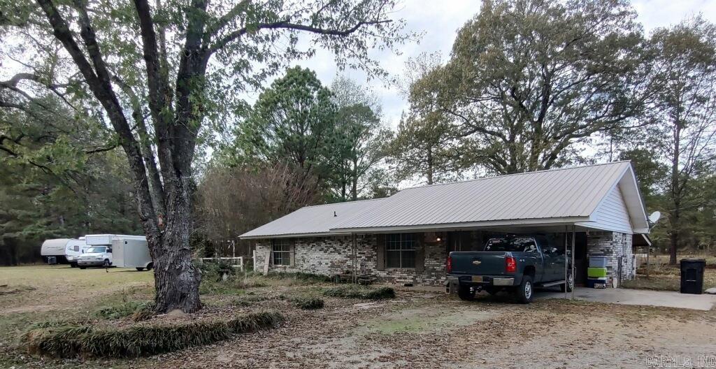 Escape to the tranquility of country living with this charming home set on +10 acres of picturesque land. Perfect for those seeking space, privacy, and a connection to nature, this property offers an ideal balance of comfort and opportunity. The home itself is nestled in a peaceful setting, surrounded by plenty of room for outdoor activities, animals, or ATV adventures. Also on the property is the large barn, equipped with electricity, a loft for additional storage or use, and a concrete-floored workshop area, making it perfect for a variety of hobbies or projects. There is a Kubota tractor that can be sold with the property as well to make maintenance of the property an ease. The land features a stocked pond, where you'll enjoy watching local wildlife come and go throughout the year, adding to the serene atmosphere. Whether you're an outdoor enthusiast, animal lover, or someone who simply appreciates wide open spaces, this property has it all. House is back on the market at no fault of the seller. Schedule your showing today.