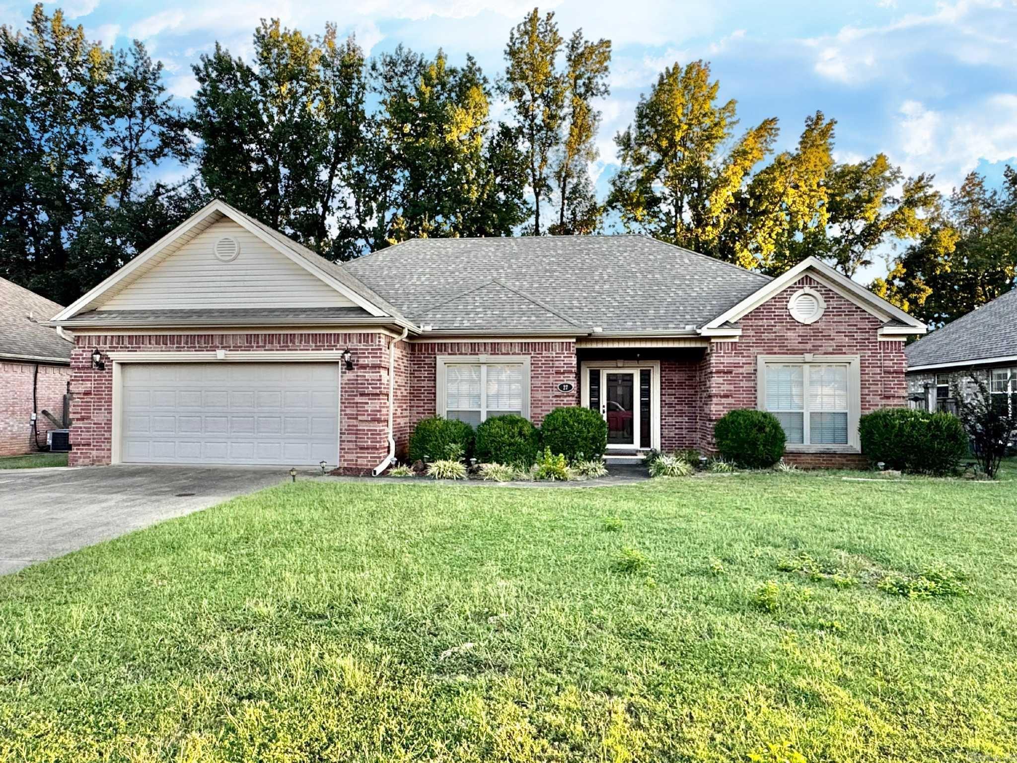 Welcome to this charming 3 bedroom, 2 bathroom all brick home in the heart of Cabot ā just minutes from schools, shopping, and local dining. The kitchen is designed for everyday living and entertaining with granite countertops, stainless steel appliances, a stylish tiled backsplash, bar seating, and a spacious eat-in area that opens to the living room. A separate dining space offers flexibility for hosting dinners or creating a home office. The primary suite feels like a private retreat with two large closets, a dual-sink vanity, relaxing soaker tub, and fully tiled walk-in shower. The second bathroom features two separate vanities and a tiled shower/tub combo, perfect for busy mornings. Spare bedrooms are roomy with plenty of storage. Step outside to enjoy a partially covered back porch overlooking the large backyard ā ideal for gatherings or quiet evenings. A storage building and extra cabinetry in the garage keep everything organized, while the tray ceiling with accent lighting in the primary adds a touch of elegance. Agents see remarks.