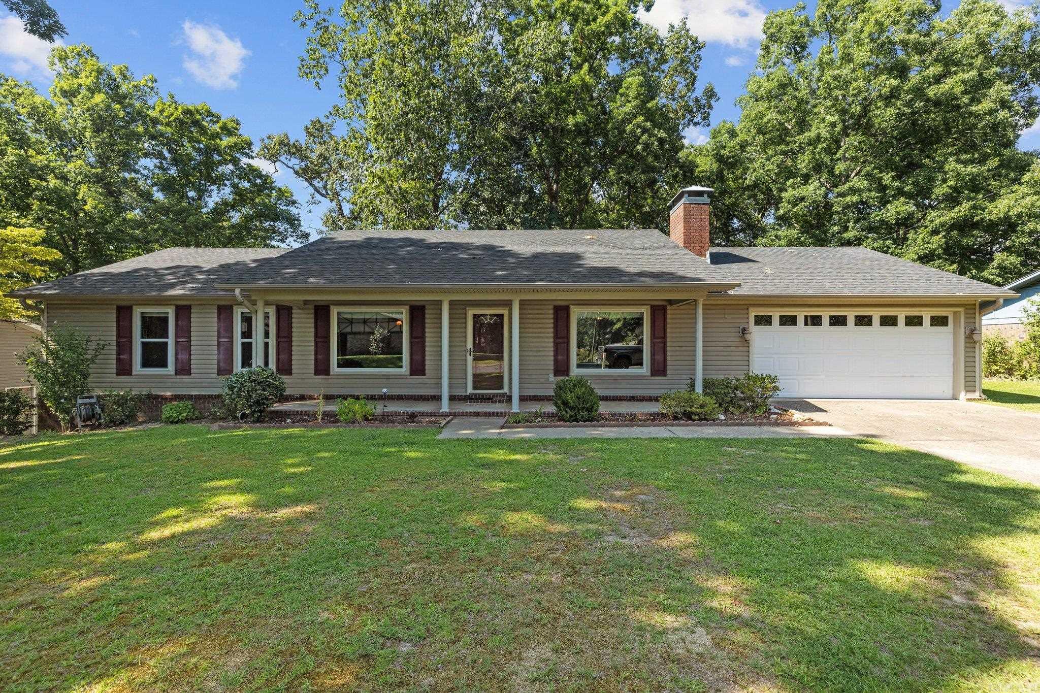 Welcome to 2808 Janet Dr in Benton, this one-level,3 bedroom 2 bath home in Oak Creek Village. A mature subdivision is known for its serene atmosphere and friendly community. The roof is one year old! The windows and siding have been updated. The living room has a vaulted ceiling, wood beams, & brick gas-burning fireplace. Large bay windows offer tons of natural lighting. This beautifully maintained residence offers the perfect blend of comfort, space, and timeless curb appeal. The lot has a fully fenced backyard with a covered back deck that offers a backyard oasis with a total of .29 an acre.