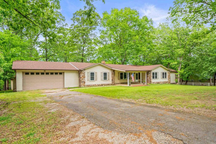 Welcome to this beautifully maintained and spacious 6-bedroom, 3-bath split-level home in Lake Hamilton School District on a 1.5-acre lot! This 3,440 sq ft home features a 2-car garage, 2 outdoor storage sheds, a covered front patio with ceiling fan, and a new back deck. Major updates include a new roof (2023), new gutters (2024), and a brand-new HVAC unit, furnace, and heat pump (2025). Enjoy two new 40-gallon water heaters (2024), a freshly cleaned wood-burning fireplace, and professionally cleaned air ducts (2024). The home sits on a paved road with an asphalt driveway and offers a great layout for families or multi-generational living. Large bedrooms, multiple living spaces, and a fully fenced backyard provide plenty of space to relax and entertain. Matching stainless steel appliances in the kitchen include double ovens, refrigerator, dishwasher, trash compactor, over the range microwave, and a glass stovetop. Conveniently located near shopping, recreation, and 5 mins from Lake Hamilton School. Move-in ready with peace of mind thanks to recent upgrades. Don’t miss this opportunity to own a well-maintained home with tons of space, modern systems, and room to grow!