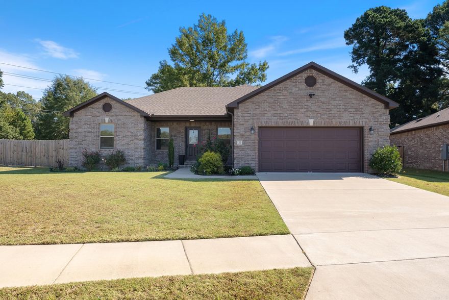 Perfectly positioned on a spacious corner lot in the highly sought-after Cabot School District, this beautiful 3-bed, 2-bath home blends thoughtful design with everyday comfort. Just blocks from Southside Elementary, it’s the perfect mix of convenience and community. Step inside to an inviting open floor plan highlighted by crown molding, warm tones, and custom finishes throughout. The kitchen features granite countertops, a large island, tiled backsplash, under-cabinet lighting, stainless steel appliances, and a pantry cabinet for extra storage — ideal for cooking or gathering with family and friends.The primary suite feels like a retreat, offering double granite vanities with extra counter space, oversized mirrors, and a luxurious bath with a walk-in closet featuring built-in shelving. Outside, enjoy your fully fenced, oversized backyard — perfect for pets, play, or quiet evenings under the stars. Come experience comfort, style, and functionality all in one beautiful Cabot home!