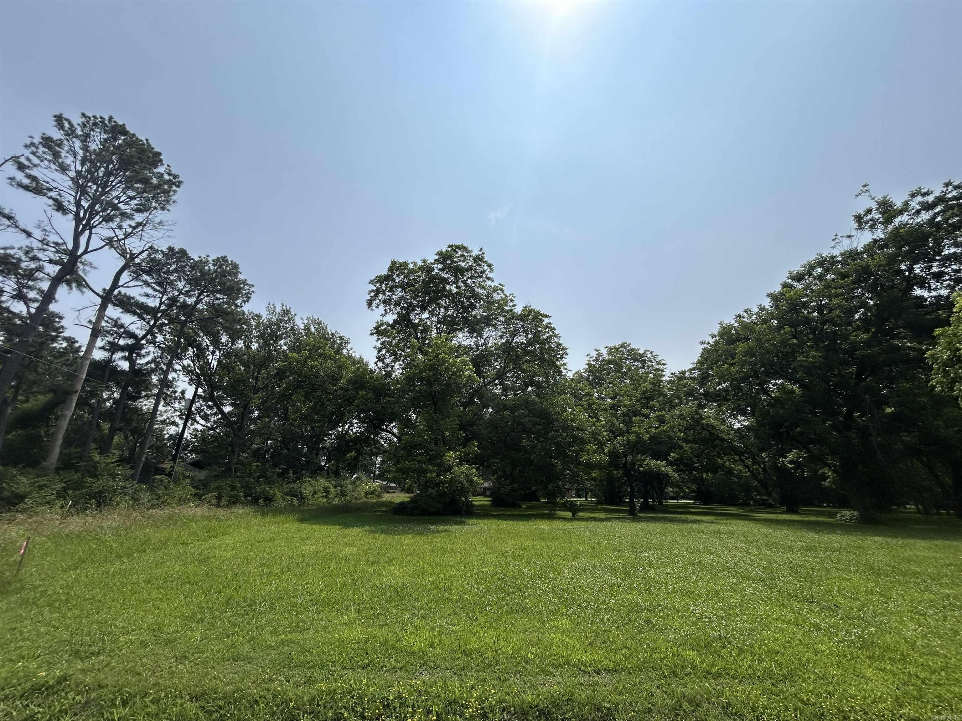 Have you been considering building a home in Stuttgart, or maybe investing in a lot to develop a residential property? This may be the one for you! This Lot will be offered alongside 8 others in Block L of the Crescent Hill Subdivision. Each lot is home to one or more beautiful, mature pecan tree(s) and utilities are conveniently available at the street. The property has been recently surveyed and is waiting for you to bring your vision to life!