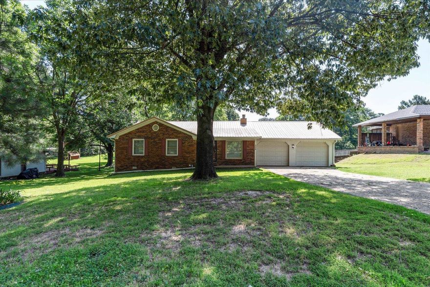 Welcome to Meadow Lark Acres, an established neighborhood conveniently located off Aggie Road and just minutes from ASU! This charming 3-bedroom, 2-bath ranch-style home offers two spacious living areas and a generous kitchen with an adjoining dining and laundry space. The home includes an attached two-car garage and a workshop for added functionality. Situated on nearly half an acre, the large backyard features mature shade trees, a deck, and wood privacy fence (installed less than 5 years ago). Additional recent updates include the AC unit, hot water heater, and gutters all under 5 years old. A storage shed provides extra space for tools and equipment. Family-friendly neighborhood setting close to shopping, dining, entertainment, and ASU. Schedule your tour today!