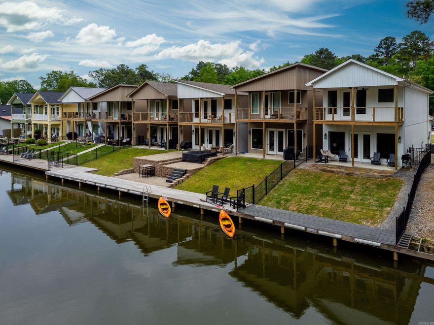 Whether you're looking for your own personal retreat or a fantastic income-producing rental, this home has it all. Enjoy direct lake access with an approximately 27-foot boat side tie—ideal for summer fun on the water! Inside, the open floor plan creates an inviting space for entertaining, with seamless flow to the outdoors and a cozy electric fireplace for year-round enjoyment. The home offers 3 spacious bedrooms plus a dedicated office, and 2.5 beautifully finished bathrooms. The primary suite is a true retreat, featuring an expansive walk-in shower, two generous walk-in closets, and access to a private upper deck with serene Lake Hamilton views. Don’t miss this opportunity to own your slice of lakeside paradise!