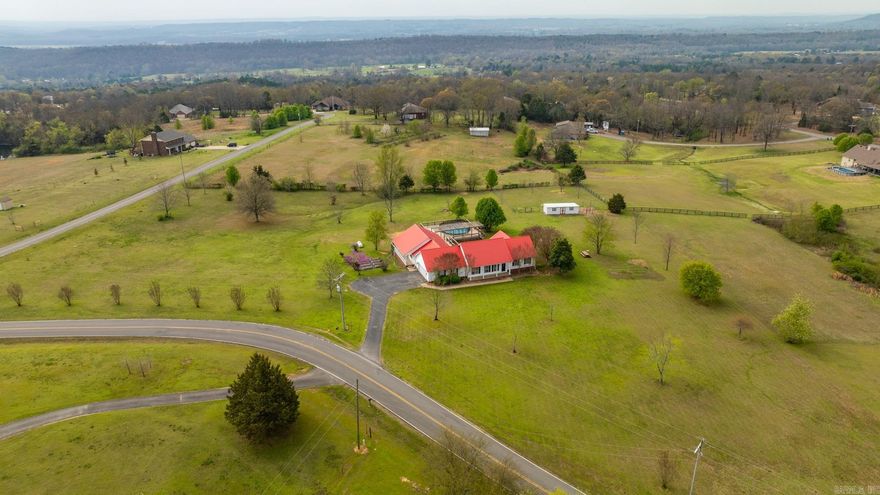 5 BEDROOMS & 3 BATHRROMS over 5 Acres with 2nd Full Kitchen in attached In-Law Quarters. Huge Decks, pool and a great fire pit area make for great outdoor entertainment spaces. Small Barn with fenced area for animals and raised beds are ready to plant. Extensive remodel was just completed and the home is move-in ready.