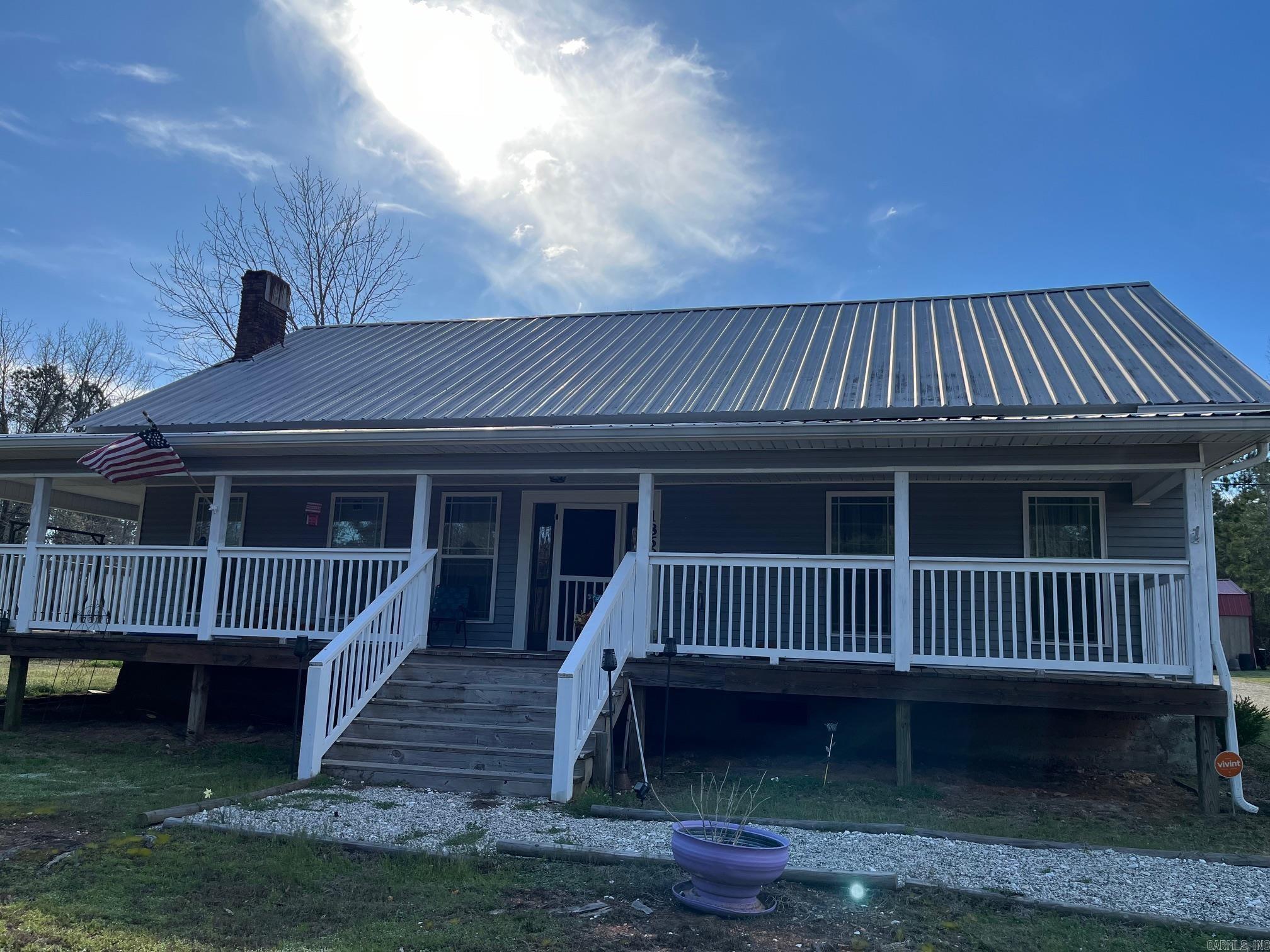 Absolutely beautiful home with all the conveniences of town & benefits of country life. Siding & metal roof make this a low maintenance home with gorgeous woodwork on the interior & covered porches across front & back hard to beat. Property also has a great pond & 2 really nice storage buildings. This home also has a prime location between Murfreesboro & Lake Greeson only a couple miles off the trout stocked Little Missouri River.