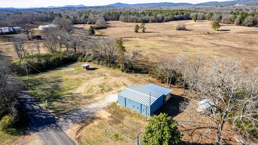 This barndominum-style home features an open concept living and two bedrooms, both with a private ensuite—new flooring throughout mini split heating and cooling system. You are sitting on a 1.30 +/- acre lot. Experience some of the most fabulous sky views with a tapestry of colors— horizons, open fields with grazing livestock in the adjoining ranch, and pasture lands. Barno-style homes have many advantages, including low maintenance, efficiency, durability, and design. Make this your retreat. This barno and the land have many options for a new owner.