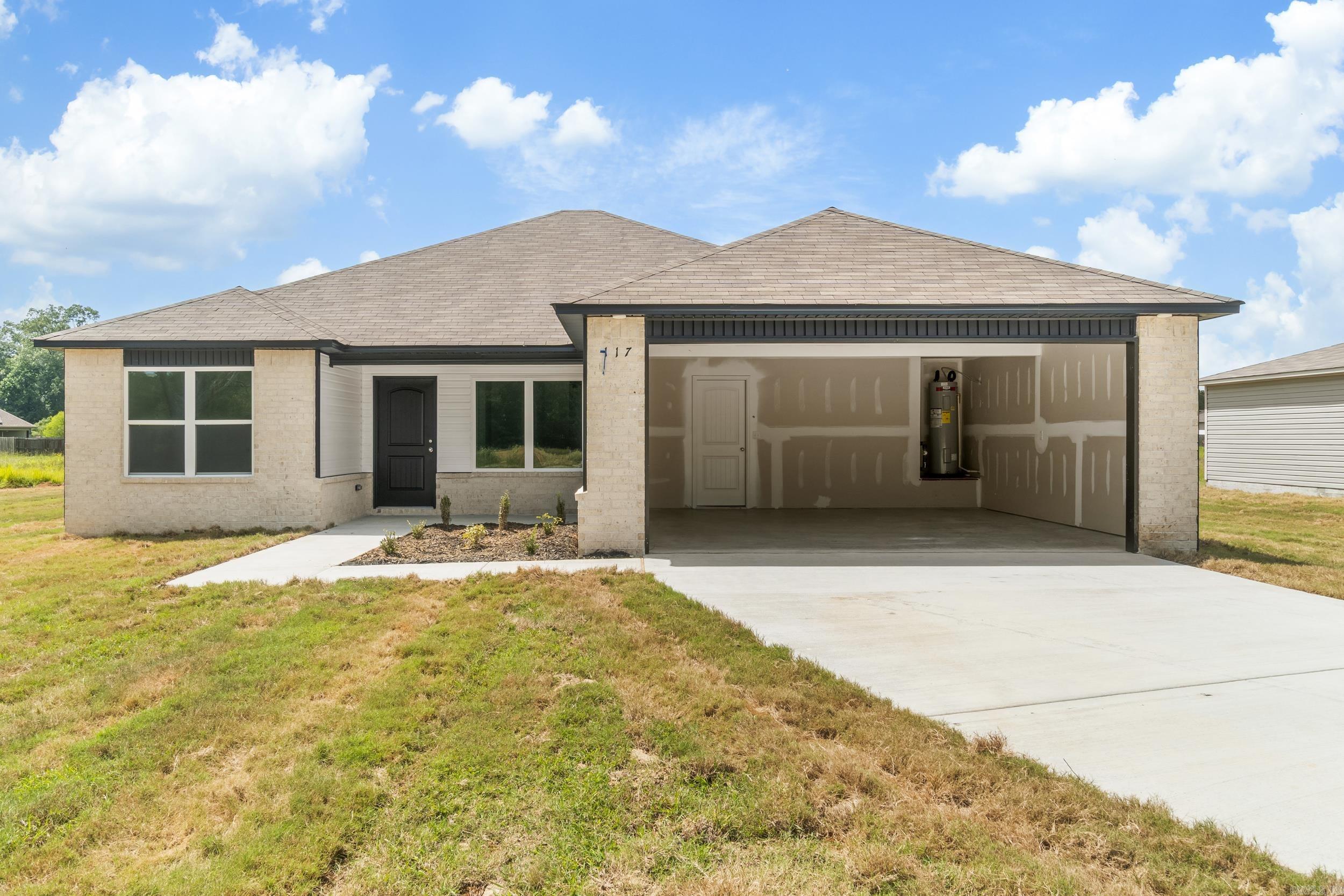 The gorgeous Lowell II plan is rich with curb appeal with its welcoming covered front porch and front yard landscaping. This home features an open floor plan with 3 bedrooms, 2 bathrooms, and an expansive living area. Also enjoy a flexible breakfast/dining area, and a beautiful kitchen fully equipped with energy-efficient appliances, ample counterspace, and a sizable pantry for the adventurous home chef. Learn more about this home today! **SEE SHOWING REMARKS & AGENT REMARKS FOR IMPORTANT INFORMATION** **SEE SHOWING REMARKS & AGENT REMARKS FOR IMPORTANT INFORMATION**