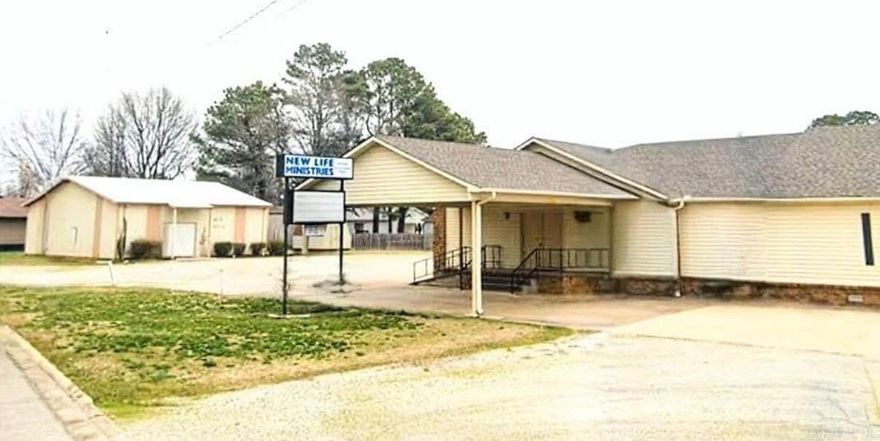 Unique opportunity in Paragould! This former church offers a fully operational facility with endless possibilities. The main building features a spacious sanctuary with pews, fellowship hall with a full kitchen, multiple offices, classrooms, storage areas, library space, and restrooms. A second building provides additional versatility with space formerly used for youth activities, its own kitchen, full bathrooms, and extra rooms. Both buildings are equipped with central heat and air, and the roof is approximately 4 years old. Ideal for a church, community center, event venue, or conversion to meet your needs!