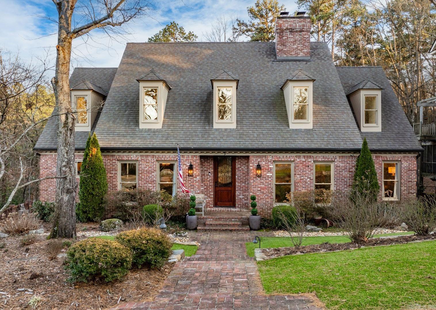Spectacular Mid-Town home in THE RIDGE. Gorgeous decor' with numerous recent updates including kitchen and baths. The ultimate home for family living and entertaining. Handsome entry flanked by banquet sized formal dining and inviting study or formal living. Fantastic gourmet kitchen with top-of-the-line appliances that flows into breakfast areas with wall of windows offering panoramic views. Large family gathering room with fireplace and access to sun terrace. Luxurious primary suite with spa inspired bath on the main level. Upper level: Three large bedroom and two additional baths. Lower-level garage with additional storage/workshop. Beautiful, gated neighborhood with natural park like setting in the heart of Little Rock. Excellent location with easy access to Downtown or West Little Rock.