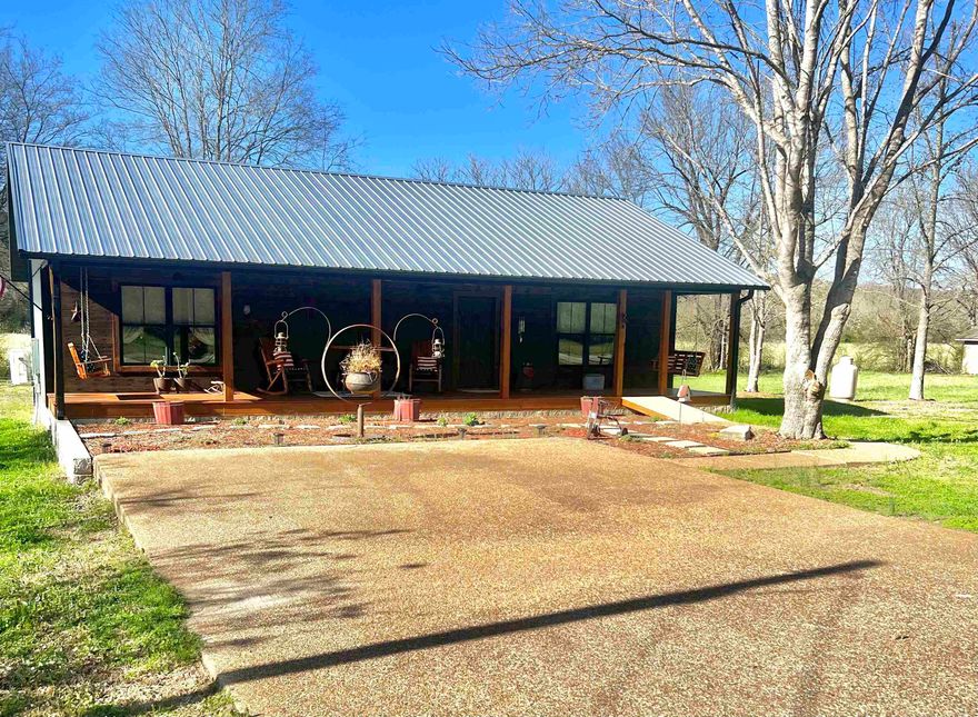 Welcome to 532 Hayden Heights Road – Rustic Elegance in the Heart of the Ozarks An inviting 2 bed/2 bath home built in 2022 with 1,316 sq ft of rustic charm. Nestled on two spacious lots just steps from the White River, this property blends handcrafted details with modern convenience. Inside, you'll find custom boxcar wood accents, handcrafted doors and cabinets, and a cozy open layout with wood & tile flooring. Two electric mini-split HVAC systems plus gas log backup ensure year-round comfort. All appliances stay, & the home has public water & private septic. Enjoy the screened porch, covered patio, & a large workshop with room for projects or an animal sanctuary. Located just a stone’s throw from the White River, this property offers easy access to world-class fishing and outdoor recreation. Set in a quiet & quaint subdivision, it’s the perfect retreat from the hustle and bustle. Whether you're seeking a full-time residence, weekend getaway, or vacation rental opportunity, this home is ready to welcome its next chapter. Don’t miss your chance to own a unique piece of Mountain View charm – schedule your private tour today!