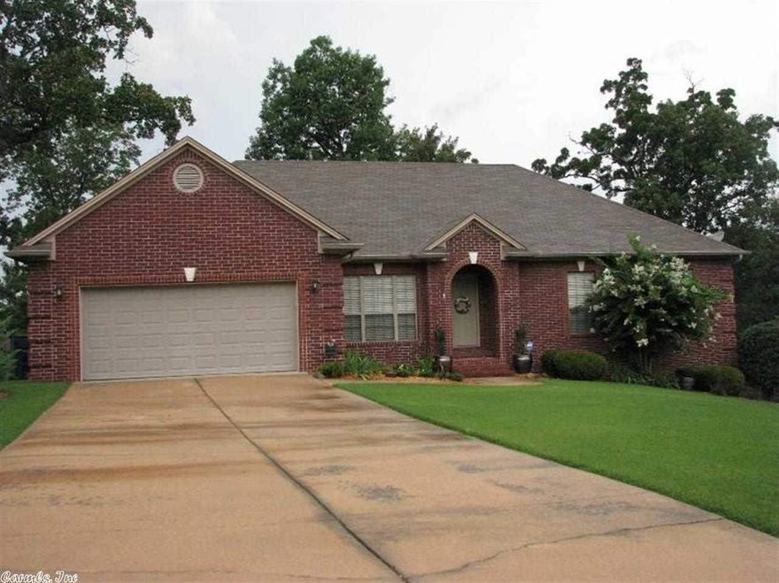 Quiet cul-de-sac, this all brick one-level home features open floor plan, high ceilings & crown moldings, Champion sunroom (2010, $32K) overlooks huge backyard. Spacious MBR w/ sitting area. Large eat-in kitchen w/gas stove top has easy access to sunroom & covered deck. Greatroom with gas fireplace opens to formal dining & kitchen with stainless steel appliances. 3 more bedrooms & 2nd bath complete this one level floor plan. Floored attic & valuable work space w/sink under house. Washer/dryer stays.