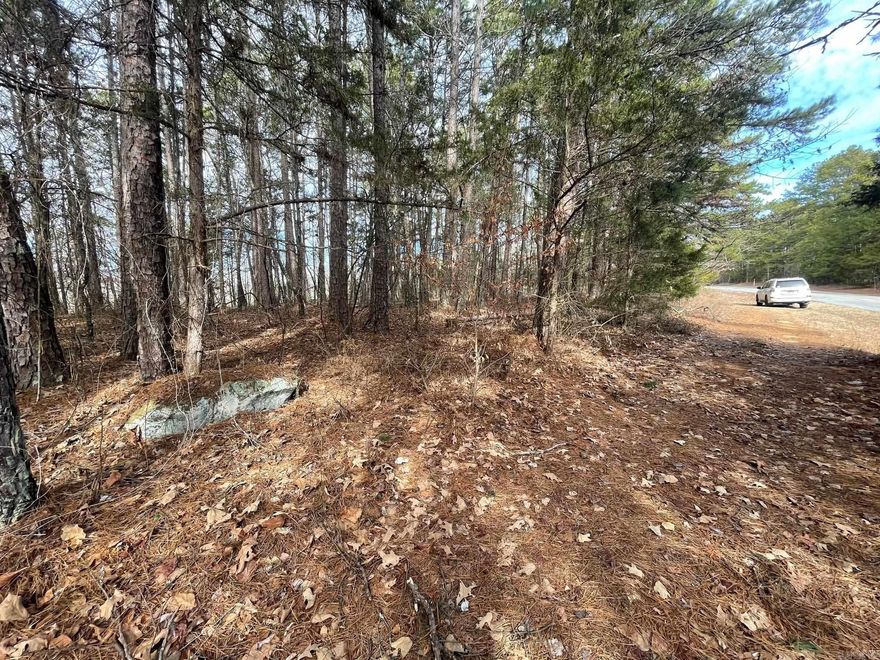 Come build your dream home today on these 3 golf course frontage lots. Enjoy living in Fairfield Bay, where every day feels like a vacation! Nestled amidst the picturesque landscapes of the Mountain Ranch Golf Course, this area offers you the perfect blend of relaxation & adventure.  With this prime location, you can indulge in your passion for golf anytime you desire. Tee off during the day & as the sun sets, bask in the breathtaking views of the shimmering lake nearby. This is the epitome of tranquil living at its finest. But that's not all! Fairfield Bay boasts a plethora of amenities to enrich your life. Within minutes of your new abode, you'll find a full-service marina, beckoning you to embark on aquatic adventures whenever the mood strikes. Dive into the refreshing waters of one of the three swimming pools, or challenge your friends to a game of tennis or pickleball. Feel the thrill of exploration as you traverse the hiking & biking trails, or opt for a leisurely round of miniature golf or disc golf. With over 80 miles of UTV trails at your disposal, the possibilities for outdoor recreation are endless.