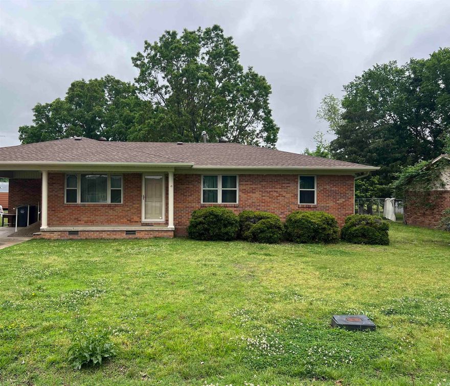 House is located close to Walnut Ridge school, features new roof and siding and a brick home