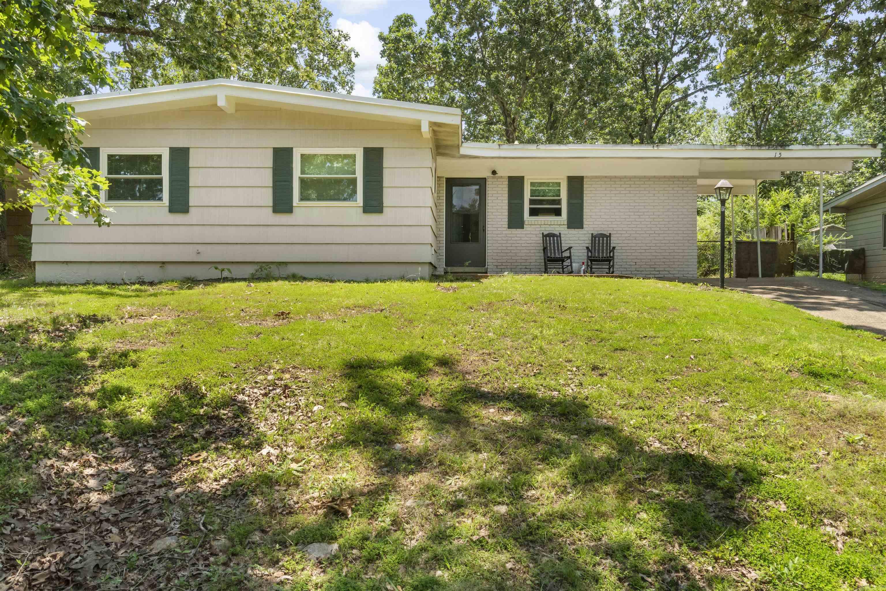 Welcome to 15 Westmont Cir, a well-maintained 3-bedroom, 1.5-bathroom home nestled in a quiet, established neighborhood in Little Rock. This home is perfect for first-time buyers, small families, or investors looking for a solid property in a convenient location. Inside, you'll find a spacious living area filled with natural light, a functional kitchen with plenty of cabinet space, and a cozy dining area that opens up to the rest of the home. The Primary bedroom has two closets. Each bedroom offers comfortable space and storage, while the half bath adds extra convenience for guests. Brand new windows, patio door, new AC, covered carport, and a big spacious backyard. Also, a storage unit attached to the side of the home. The backyard is a great size—ideal for outdoor gatherings, gardening, or simply relaxing after a long day. Just 15–20 minutes from Downtown Little Rock with easy access to I-630, this home is close to shopping, dining, schools, and more.