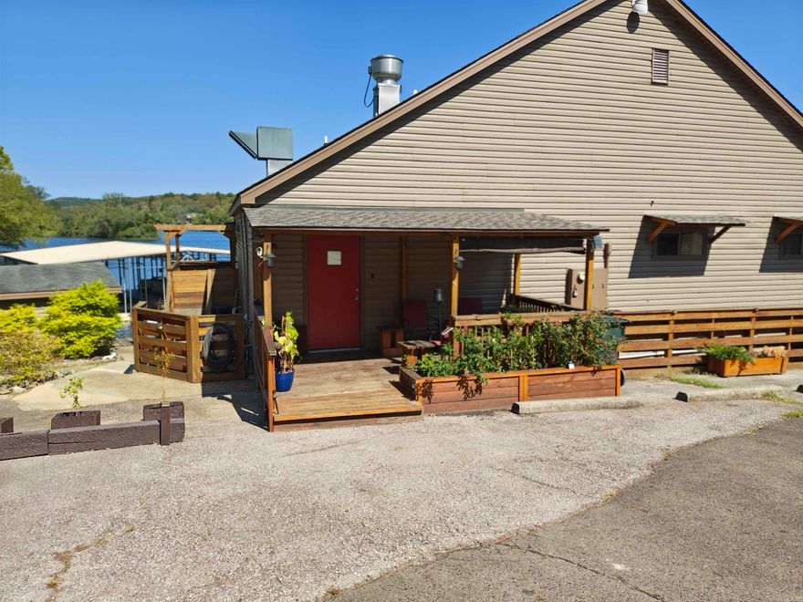 This completely furnished beautiful month to month long term rental sits on a level lake lot on Lake Catherine in the serene Diamondhead Community.  The home comes with 2 parking spaces and 1 boat slip. When the long term, month to month lease is terminated, it will then be put on nightly rental. No pets allowed, 10:00 p.m. quiet time, cedar lined closets, new TV, electric fireplace, all utilities paid except for wi-fi, washer & dryer, refrigerator, loft upstairs that could be used for an extra bedroom or office.  The community amenities include golfing on the 18-hole PGA golf course, fishing, boating, swimming in the Olympic sized pool, club house with restaurant, children's playground, tennis, basketball & pickle ball courts, and picnic area.  You will enjoy entertaining on the large outdoor deck overlooking the lake.