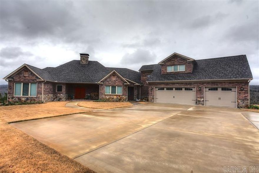 AMAZING BUILD W/STUNNING VISTA VIEWS!  Beautifully situated with wonderful detailing.  Master plus 3 bedrooms on main level.  Upstairs has 4th bedroom/full bath and bonus/office area.  Gorgeous Cathedral ceiling in Greatroom with floor to ceiling stone fireplace; site finished oak hardwoods.  Kitchen has hickory cabinets & Bosch Appliances. Tons of extras which include: Automatic generator; 500 gal. underground propane tank; Privacy gate; paved driveway; Storm Room.  Exceptional Quality.  *Agents" See Rmks*