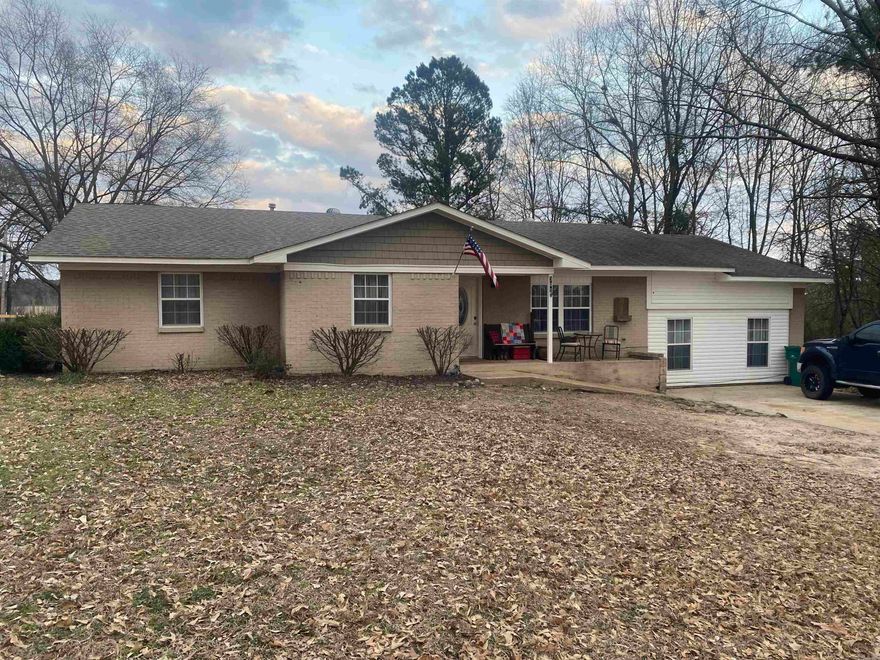 Brick home w/approx 2,000 sq ft of living space, 4 bedrooms and 3 full baths.  This home is move in ready and offers lots of space indoors and out.  Oversized living room with wood burning fireplace opens to dining area and kitchen.  All appliances including: dishwasher, stove and refrigerator to convey.  CH/CA (gas heat), gas hot water heater, newer windows, newer roof and extra insulation.  Nice large wooden deck - great for entertaining family and friends or relaxing after a long week. Contact our office for more details or to schedule your personal tour.