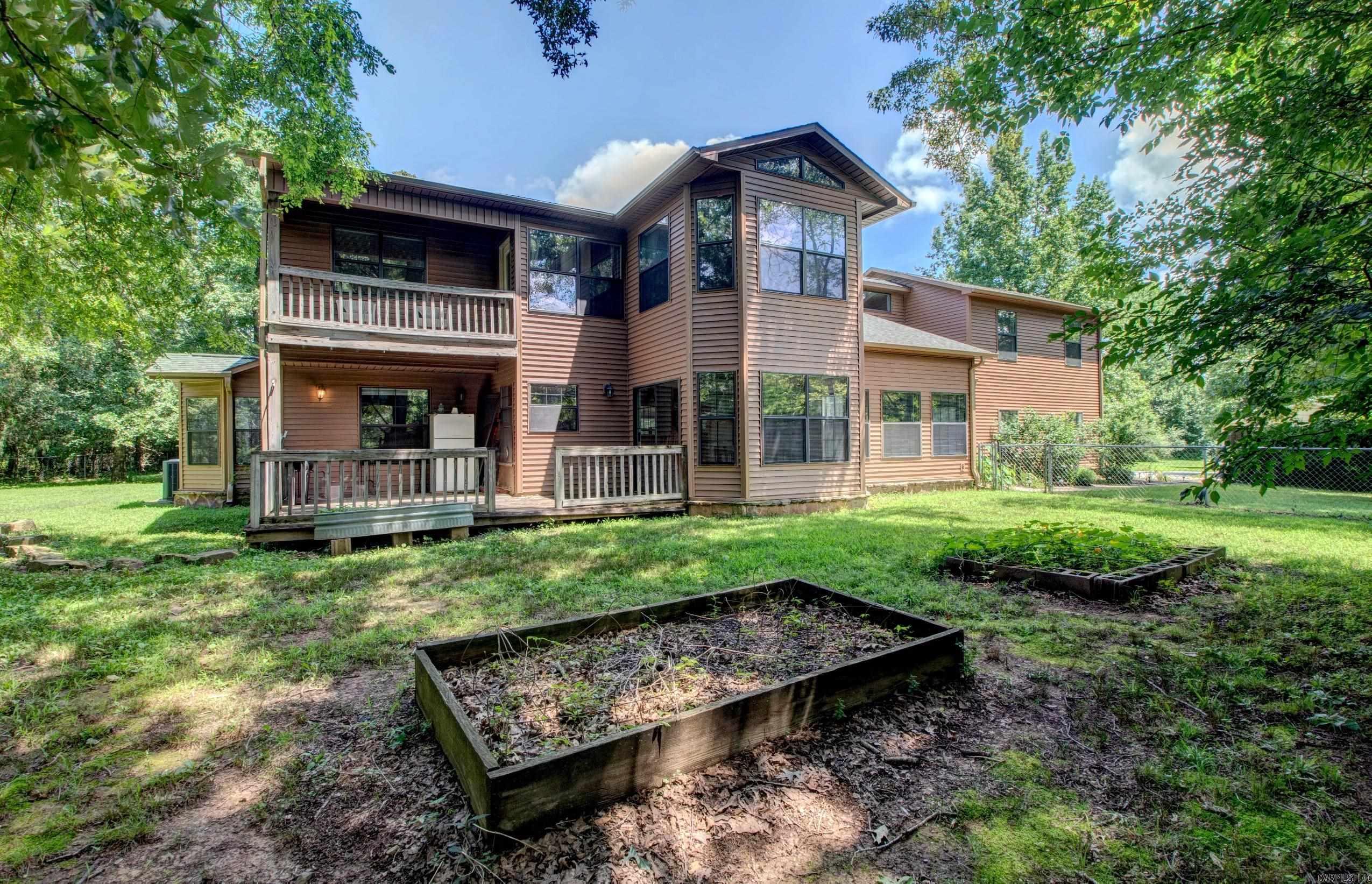 Looking for some added privacy? If so, this home is perfect for you! The beautiful 3 bedroom, 2 1/2 bath home is tucked away on just under 5 wooded acres. Your guests will be in awe as they enter the spacious living area with an abundance of natural light and a gorgeous, vaulted ceiling. The open floor plan that leads right into your kitchen/dining combo is perfect for those large family & friend gatherings. The home features many updates which includes a new roof, siding, HVAC and water heater. Upstairs, the huge primary bedroom offers access to an outside balcony where you can enjoy the peaceful outdoors and an on suite with a soaker tub, vanity and walk-in shower. The upstairs bonus room provides extra living space that would be perfect for a home office, playroom or media center! Enjoy the remainder of your summer days as you relax and soak up the sun in your refreshing swimming pool with only the sounds of nature! Call today to schedule your showing! See Agent Remarks!!
