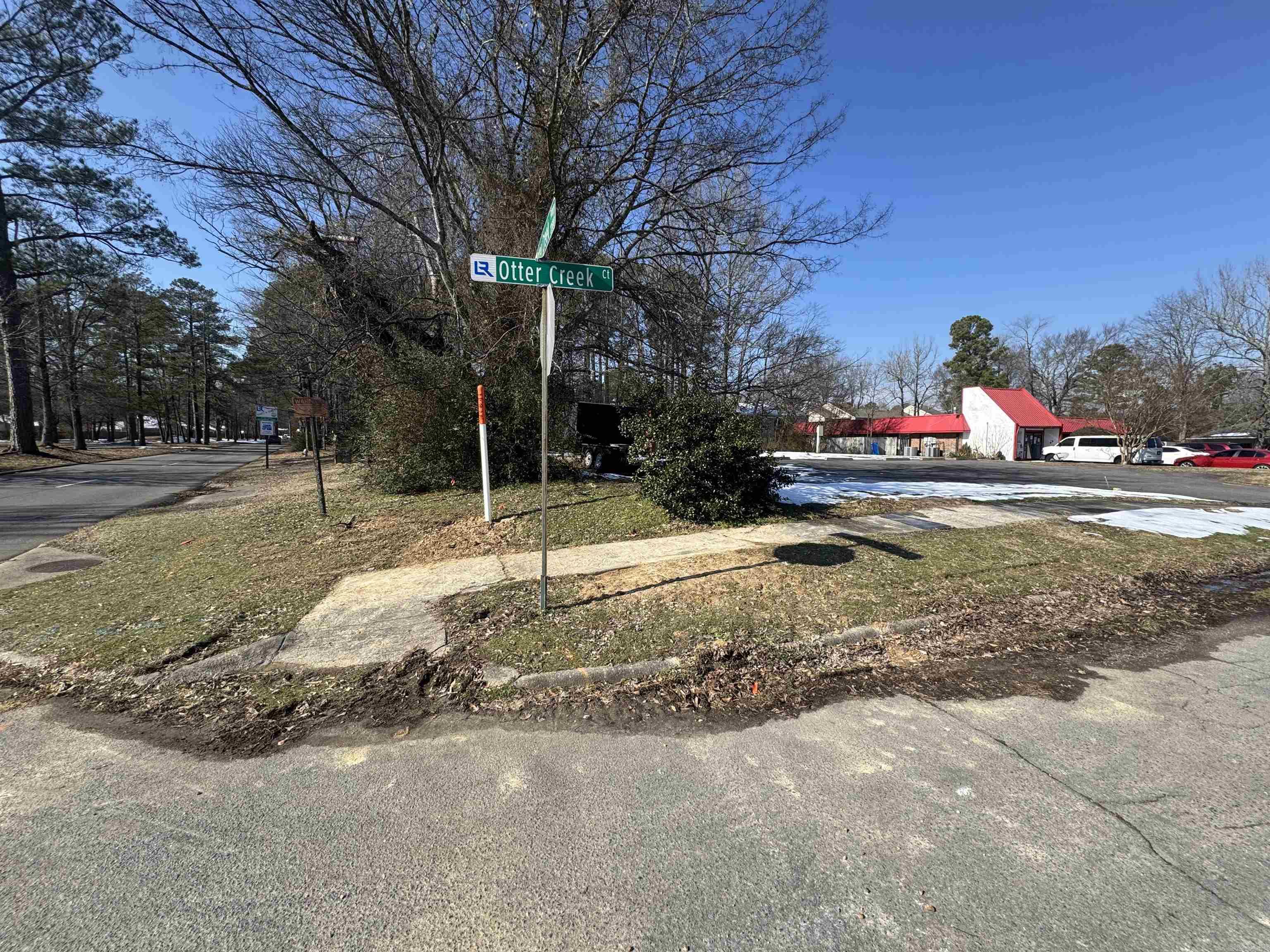 Commercial lot. Zone C1. See documents for survey and permitted uses. Flat. Utilities available.