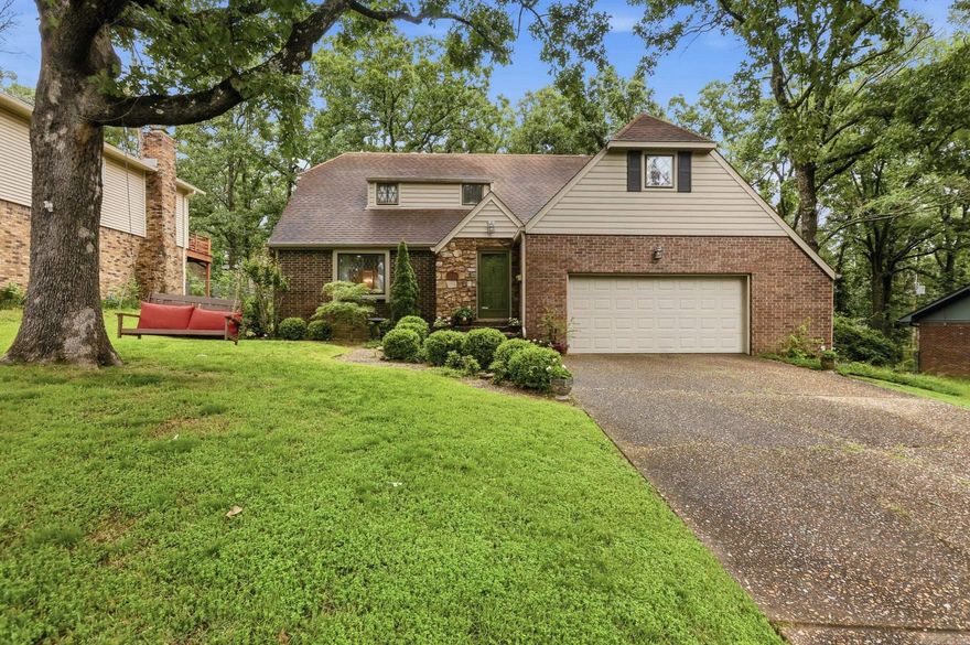 Timeless Tudor-inspired charm nestled beneath mature trees in Colony West. Meticulously maintained and full of warmth, this classic home blends character, comfort, and meaningful updates in one of West Little Rock’s established neighborhoods. A welcoming exterior of brick, stone, and architectural detail creates storybook curb appeal, while inside, the spacious living and dining room combination offers flexibility for entertaining, gatherings, or everyday living. All bedrooms are thoughtfully located upstairs, creating a functional separation between living and private spaces. Step outside to a lush backyard retreat perfect for evenings around the firepit, mornings in the garden, or relaxing beneath the shade of mature trees. Even better, this home is just a two-minute walk to the neighborhood park and pool, making it easy to enjoy summer afternoons, outdoor play, and community amenities. Pride of ownership shines through with numerous recent updates including hot water heater (2021), upstairs A/C unit and attic furnace (2023), kitchen lighting (2023), upstairs bathroom vents (2023), porch light/fan combo (2025), garbage disposal (2025)