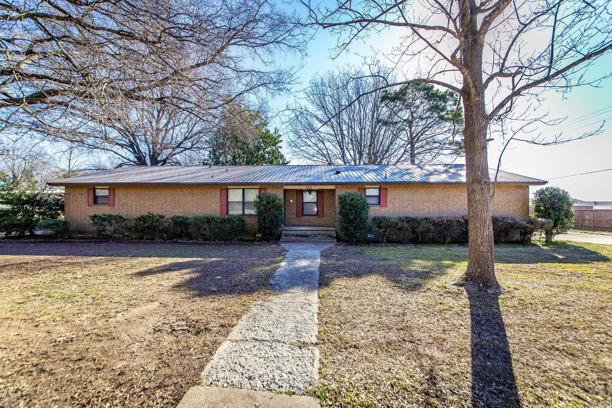 Welcome Home! This 3-Bedroom, 3-Bath home has so much to offer. A large Corner lot with fully fenced backyard, Newer Metal Roof (2023), Open floor plan, Engineered Hardwoods in main living space, Huge Mud Room with bathroom, bonus room/office/formal entry, Screened in Porch, Extra Covered parking, Outside Storage, and located in a Great Neighborhood. Schedule your showing today!