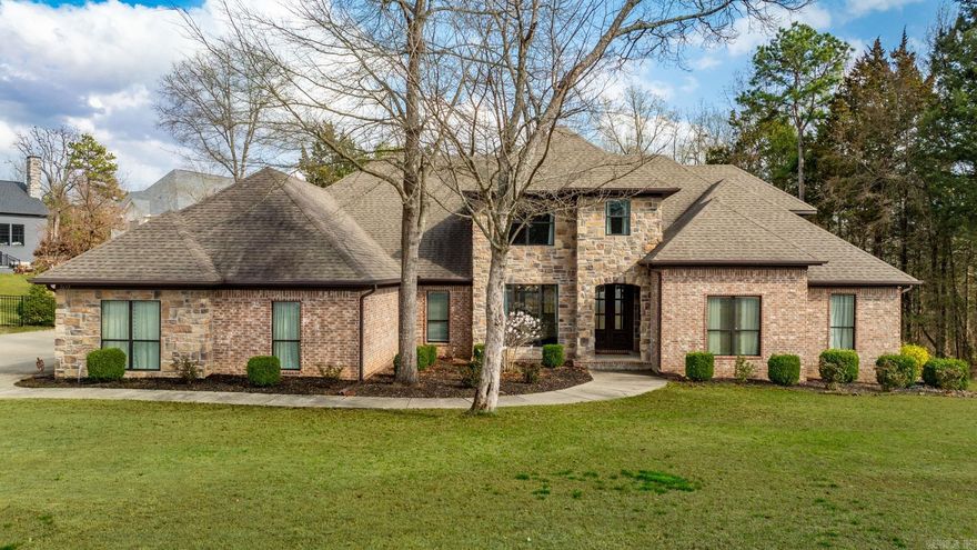 This spacious home boasts an open floor plan perfect for entertaining guests. The kitchen, living room, breakfast eating area, and formal dining room flow seamlessly together. The main living room impresses with its stunning 20-foot ceiling, creating a grand ambiance. The large master bedroom features a private master bath with his and her sinks, alongside a generous master closet. Additionally, there are four sizable bedrooms located downstairs. Upstairs, you'll find a living area, a versatile bedroom/office space, a bonus room, and another bathroom for convenience. The home includes desirable features such as a walk-in pantry, a tornado shelter for safety, a sprinkler system for easy lawn maintenance, a natural gas stove top for efficient cooking, and an oversized 3-car garage. Perfect family home.