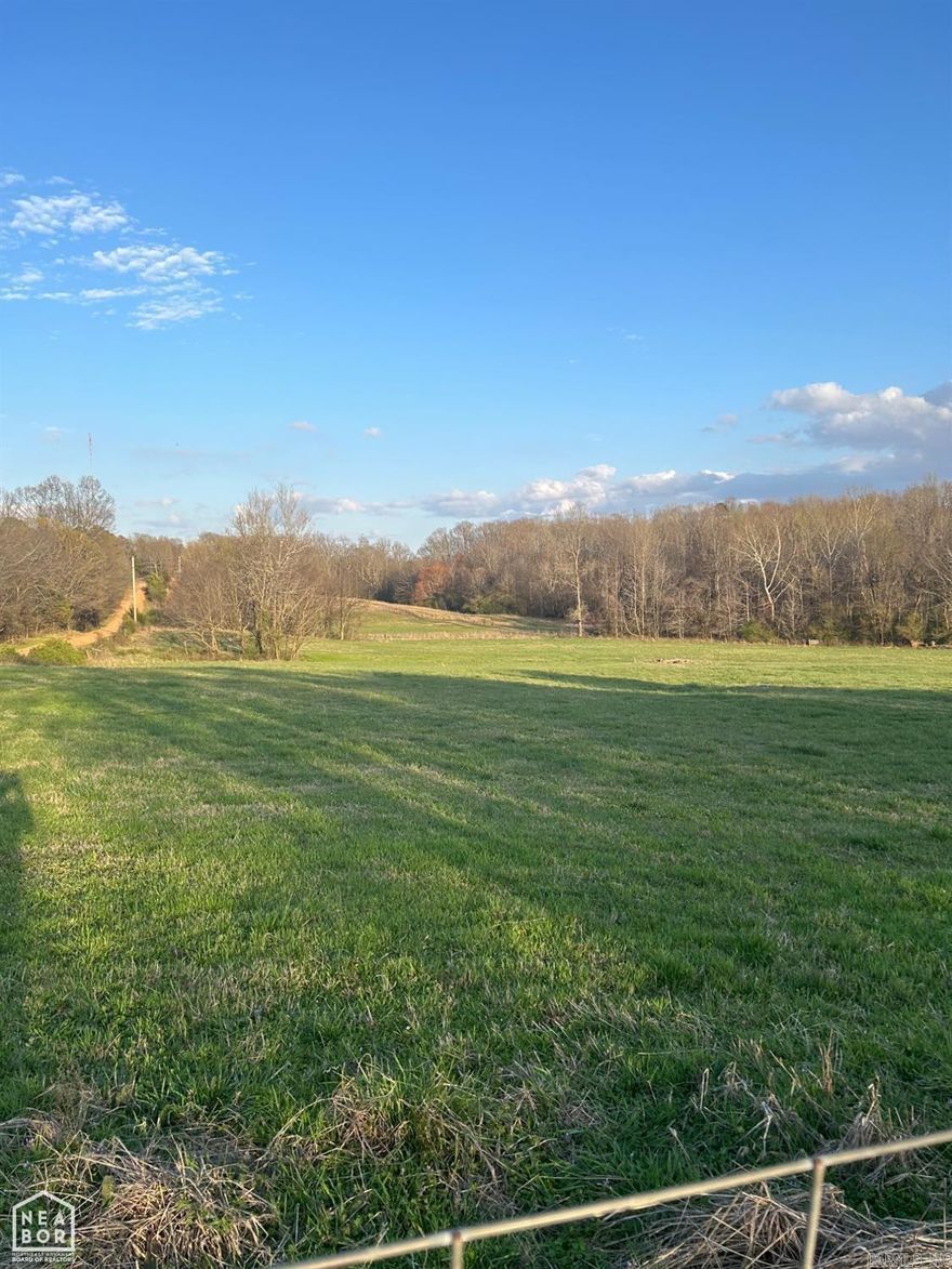 This is a wonderful opportunity to have your own acreage close to Harrisburg and Jonesboro also. Not too far out but far enough to be very comfortable country living and maybe even own cattle if you choose! Water and electric is available at the road.