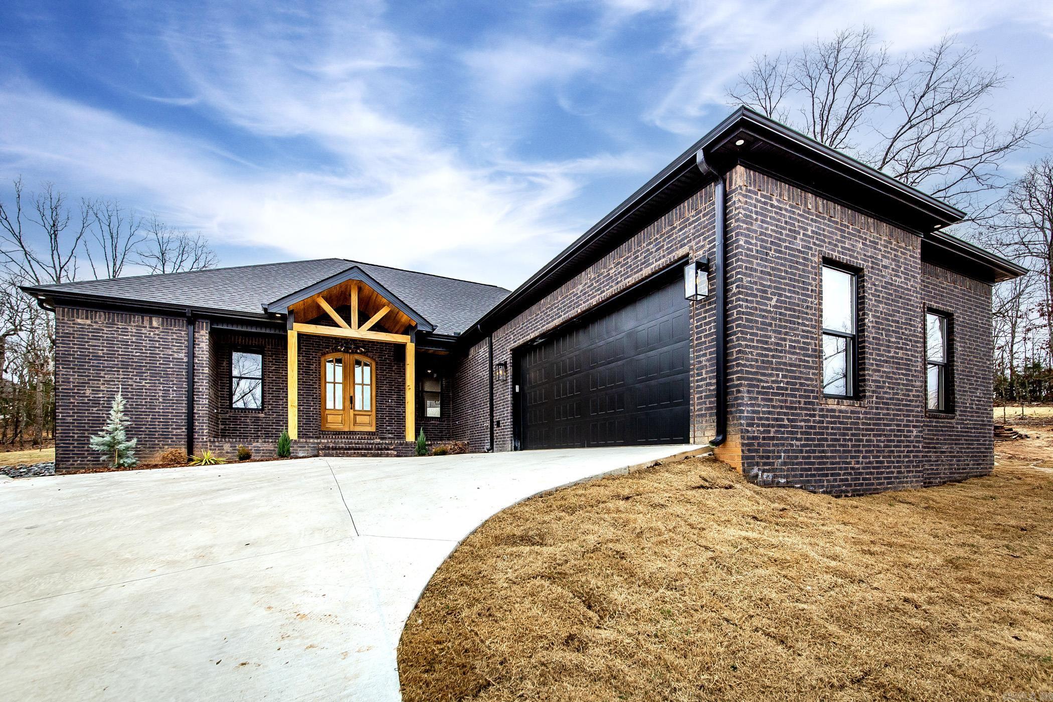 Beautiful new construction ready for it's new owners! This 4 bedroom home is perfect for entertaining with a large open living room, kitchen, and dining rooms. There is so much to see and beautiful finishes to boot! There are tons of cabinets and counterspace in the kitchen with room for all the chefs. The walk in pantry is what dreams are made of. One of the secondary bedrooms has it's own bath and can act as a second primary. The primary bedroom has a huge closet and gorgeous ensuite bath with soaking tub and tiled walk in shower. His and hers vanities with a dressing/makeup area as well. In the laundry, built in pedestals for the washer and dryer to save your back from bending over. Call today to see this one! See Agent Remarks for entrance!