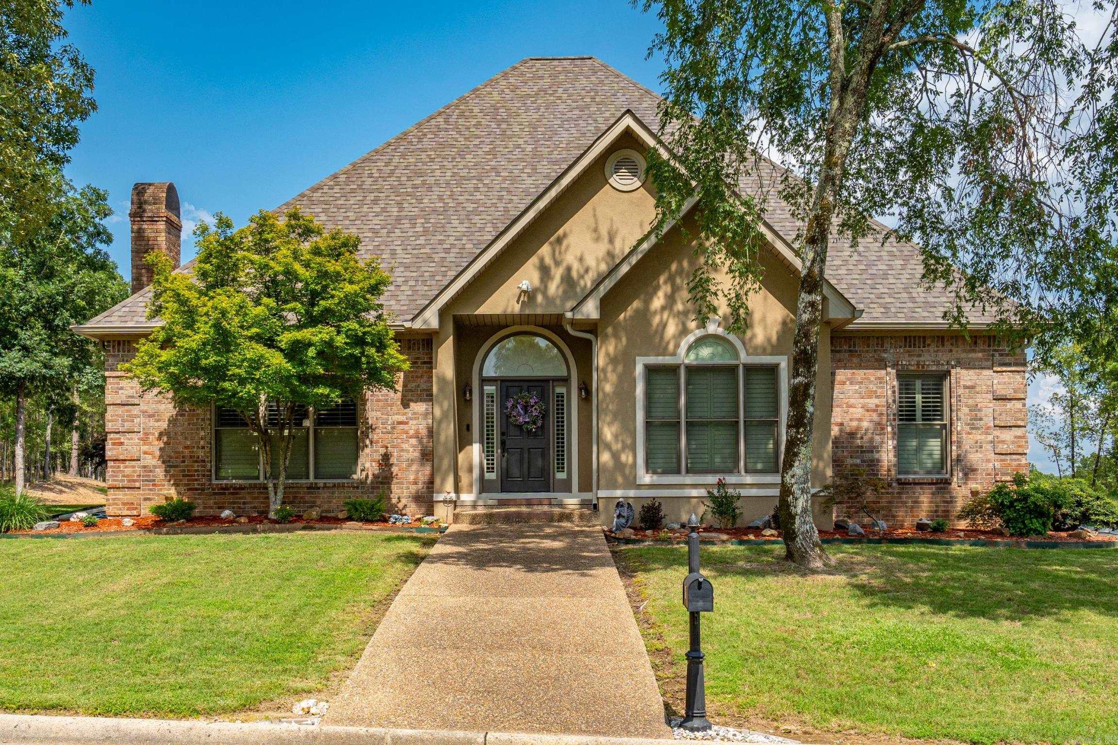 **Welcome to this stunning home nestled in a gated community within the sought-after LSSD!** This beautifully designed property situated on a DOUBLE lot features an open floor plan with granite counters, tray ceilings, and a formal dining room perfect for entertaining. The kitchen and living room flow seamlessly together, highlighted by a cozy gas fireplace and a custom entertainment center. Enjoy your mornings in the screened sun porch or entertain with ease at the wet bar. The spacious primary suite offers a true retreat, complete with double vanities, a walk-in closet, tiled shower, and a luxurious jetted tub. Upstairs, you’ll find a versatile bonus room—ideal for a 4th bedroom, home office, gym, or playroom. A large double garage with epoxy floors and added storage round out this gorgeous home, ready for a new owner. The gated community offers hiking/biking trails, community pool and not one but 2 fishing lakes for hours of peaceful relaxation! Don’t miss the opportunity to own this exceptional home in one of the area’s most desirable neighborhoods! Welcome to Red Oak Ridge...and Welcome Home!