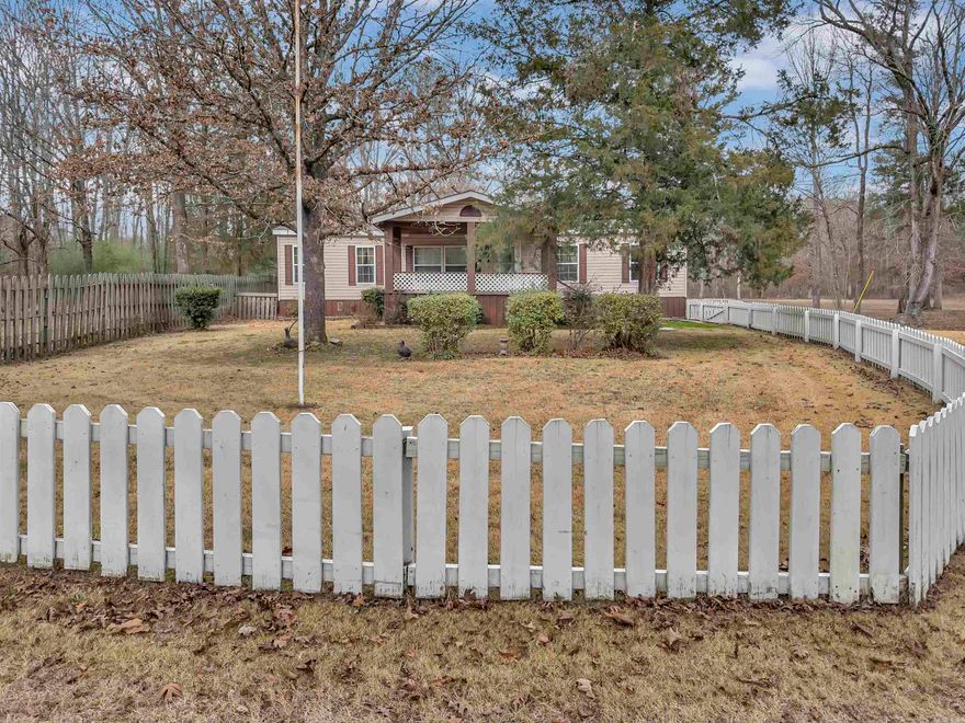 3/2 manufactured home on 3 acres with an outdoor shop offers a good amount of space and utility. The acreage provides privacy and room for outdoor activities, while the shop is perfect for hobbies, storage, or a home business. Front and back covered porch and deck. Partially fenced in areas. All electric appliances for easy maintenance. This sale is subject to court approval. Selling AS IS!