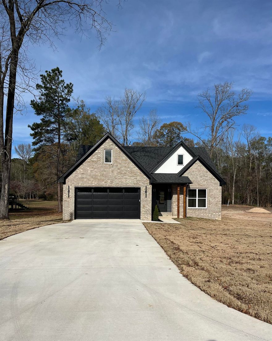 This new construction home features 4 bedrooms with 2 full bathrooms or could be 3 bedrooms with a home office/playroom. It is located on a quiet street in Sheridan on a over 1 acre of land. Great community with a great school district!